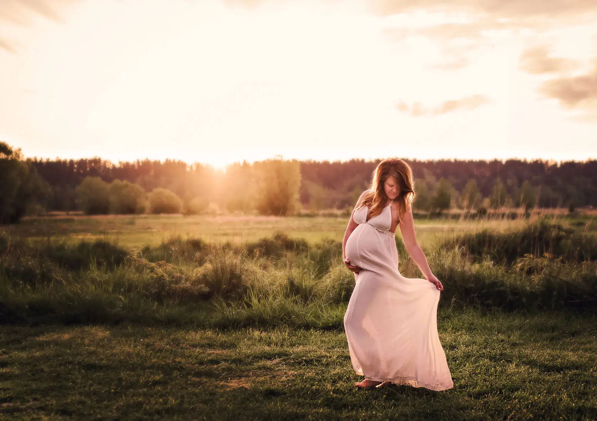 Maternity portrait in a golden field